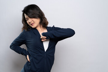 Woman has body pain isolated over white background