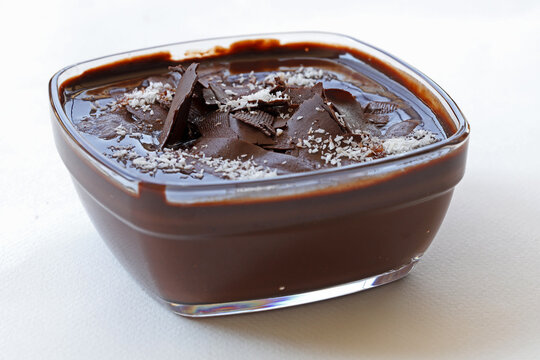 Supangle (pudding) dessert in glass bowl, on white background.