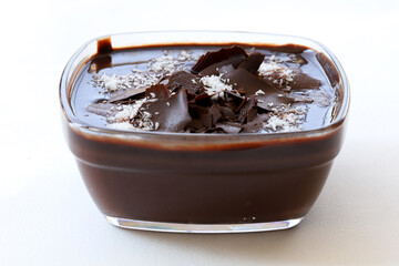 Supangle (pudding) dessert in glass bowl, on white background.