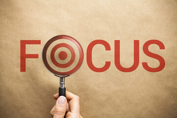 Magnifying glass over the word Focus