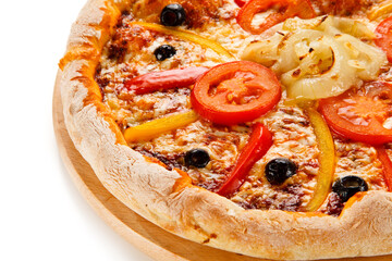 Pizza with tomatoes, pepper and olives on cutting board