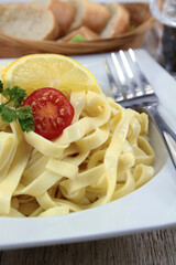 fresh tagliatelle butter on a plate