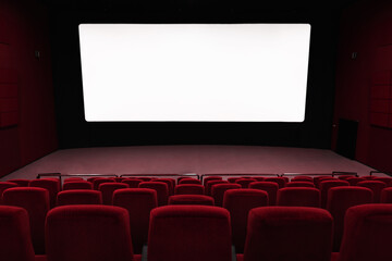 Empty of cinema in blue color with white blank screen. Mockup of hall, no people and auditorium