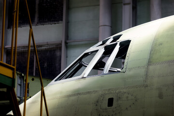 fragment of fuselage new aircraft at assembly line on plant
