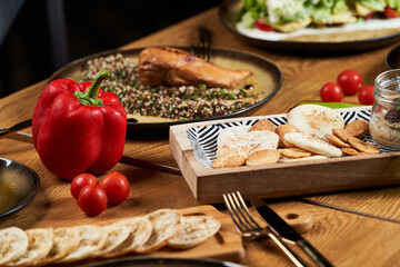 Assorted food set on wooden table. Luxury restaurant food