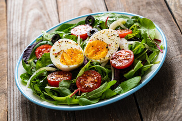 Salad with boiled egg and vegetables