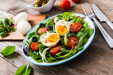 Salad with boiled egg and vegetables