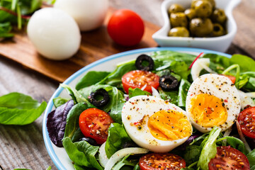 Salad with boiled egg and vegetables