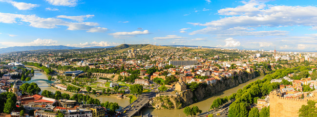 Panoramic view of Tbilisi city from the Narikala Fortress, old town and modern architecture. Tbilisi the capital of Georgia © miklyxa