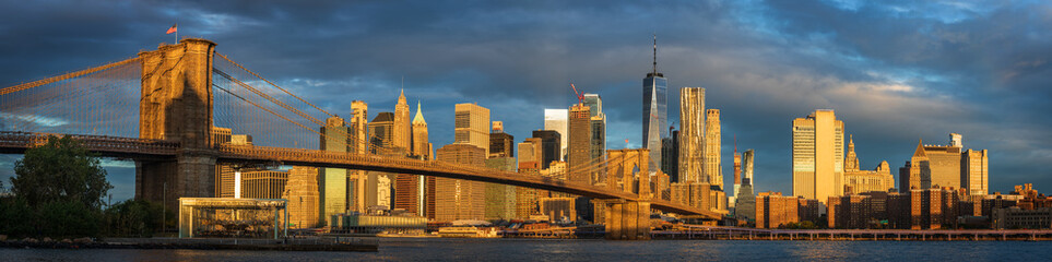 Sunrise at Brooklyn Bridge Park with view to Manhattan Skyline.