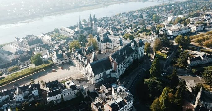 View from drone of French city of Blois with Royal Chateau and church of St. Nicolas in sunny autumn day