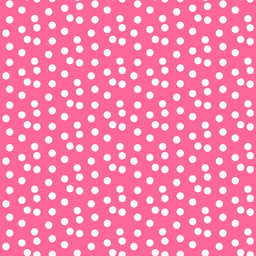 Baby pink background scattered dots polka seamless pattern