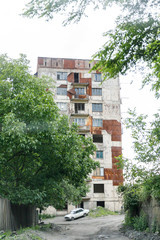 Partially abandoned building on the rock and Upper cable car station Perevisa
