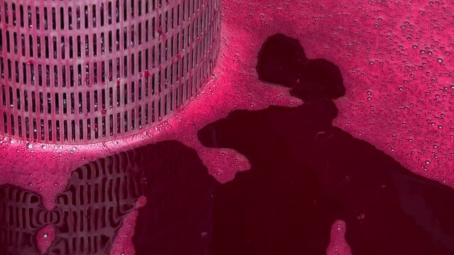 Wine mixing during fermentation process in barrel