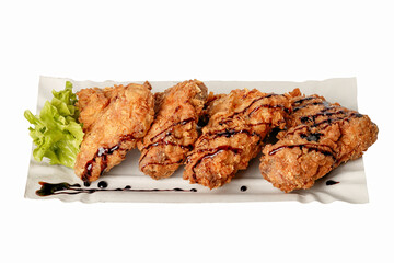 Delicious fast food street food breakfast chicken wings fries meal on paper plate