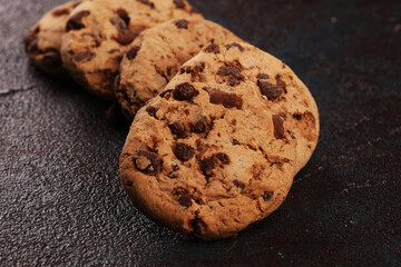 Chocolate cookies on wooden table. Chocolate chip cookies shot on table
