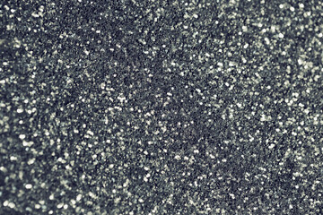 Abstract glittering background. Christmas or birthday backdrop. Party, holiday and festive concept.