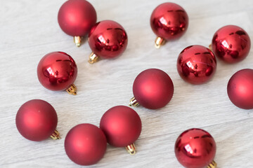 Christmas decoration and celebration. Xmas red balls. New Year preparations. White background. New Year concept.