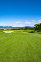 Golf Course with beautiful green field. Golf course with a rich green turf beautiful scenery.