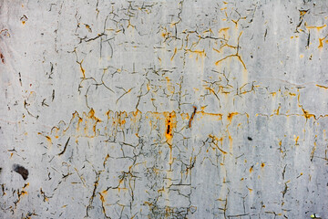 Metal texture with scratches and cracks which can be used as a background