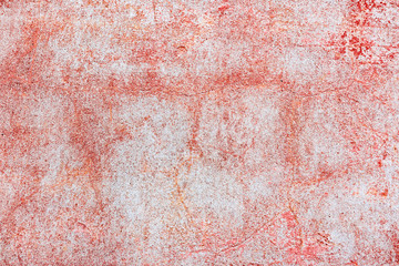 Texture of a concrete wall with cracks and scratches which can be used as a background