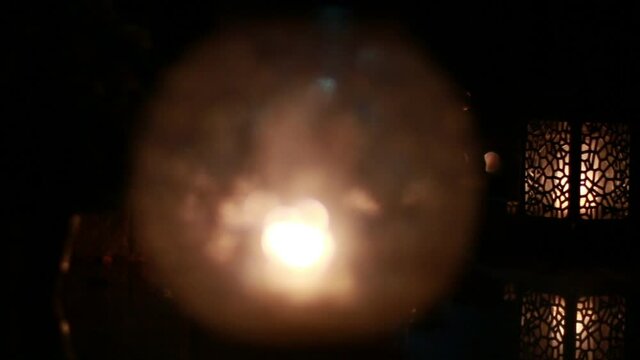 Close-Up Of Candles Burning At A Cemetery During All Saints Day.