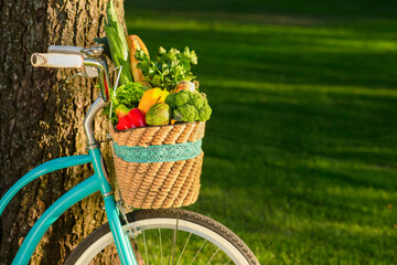 Fruits and vegetables in basket on a bicycle