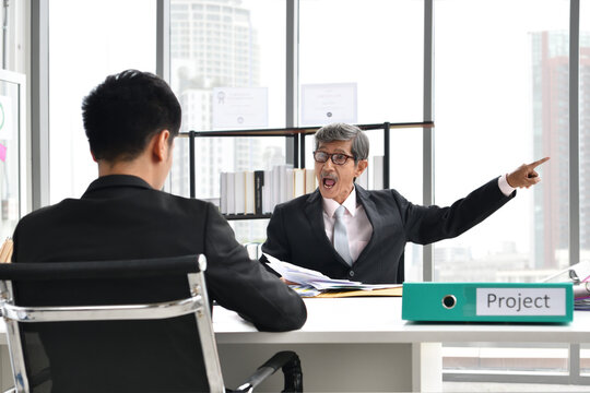 Angry yelling boss point arm to exit dismissing, Business concept, Asian people