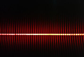 Red vertical spikes coming from digital led lamps background