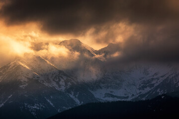 Sunset with Tatra Mountains in background from Poland Zakopane in golden hour
