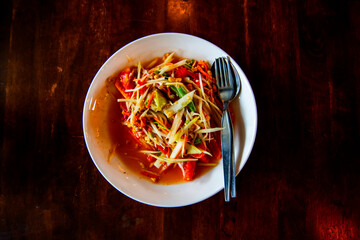 Papaya salad, delicious, sweet and sour, spicy seasoning cooking from papaya a popular country Thailand