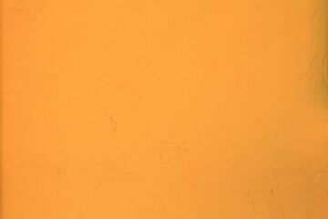 Yellow texture paint concrete wall background.