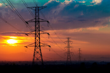 silhouette of high voltage electrical pole