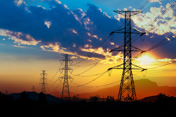 silhouette of high voltage electrical pole