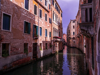 Fototapeta na wymiar Venezia narrow water lanes and the unique town architecture