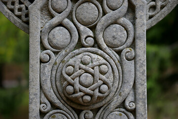 Intricately carved gravestone with celtic design