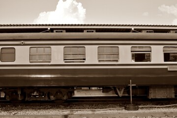 Side view of old vintage bogie of diesel electric locomotive train on railroad track, Take picture from the platform.