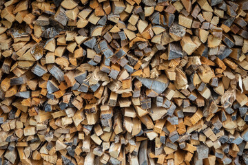 Closeup stack of firewood pattern on floor for background