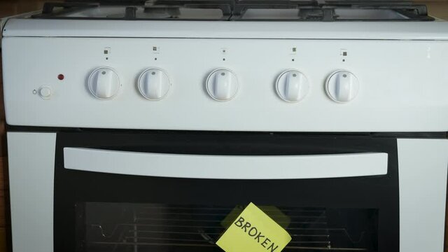 Broken stove. The writing on the gas oven is broken.