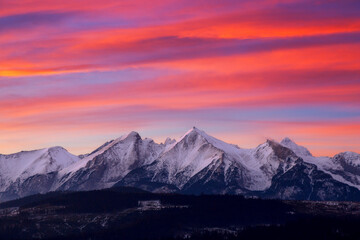Naklejka na ściany i meble Tatra Mountains in winter wiev from Zakopane Poland in sunrise