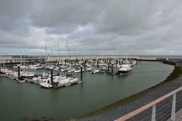 Fototapeta premium Cadzand (Holland). August 2017. Artificial bay. Mooring for boats and boats.