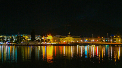 Light reflections of the building falling on lake lucerne