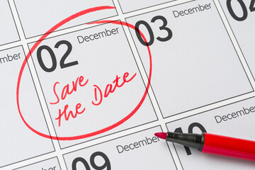 Save the Date written on a calendar - December 02