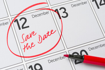 Save the Date written on a calendar - December 12