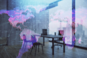 Obraz premium World map hologram and minimalistic cabinet interior background. Double exposure. International business concept.