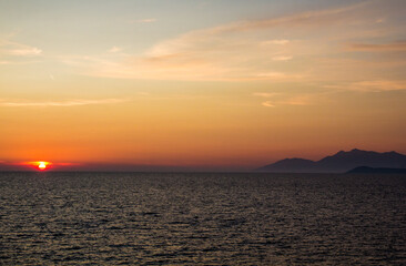 Fototapeta premium sunset at sea and mountains
