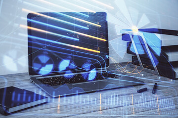 Business theme concept hologram with desktop office background. Double exposure.