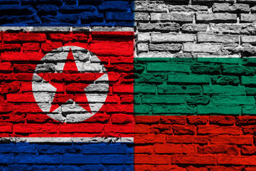 Flag of Bulgaria and North Korea on brick wall