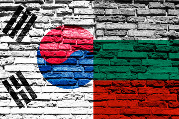 Flag of Bulgaria and South Korea on brick wall