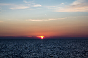 red sunset on the blue sea 